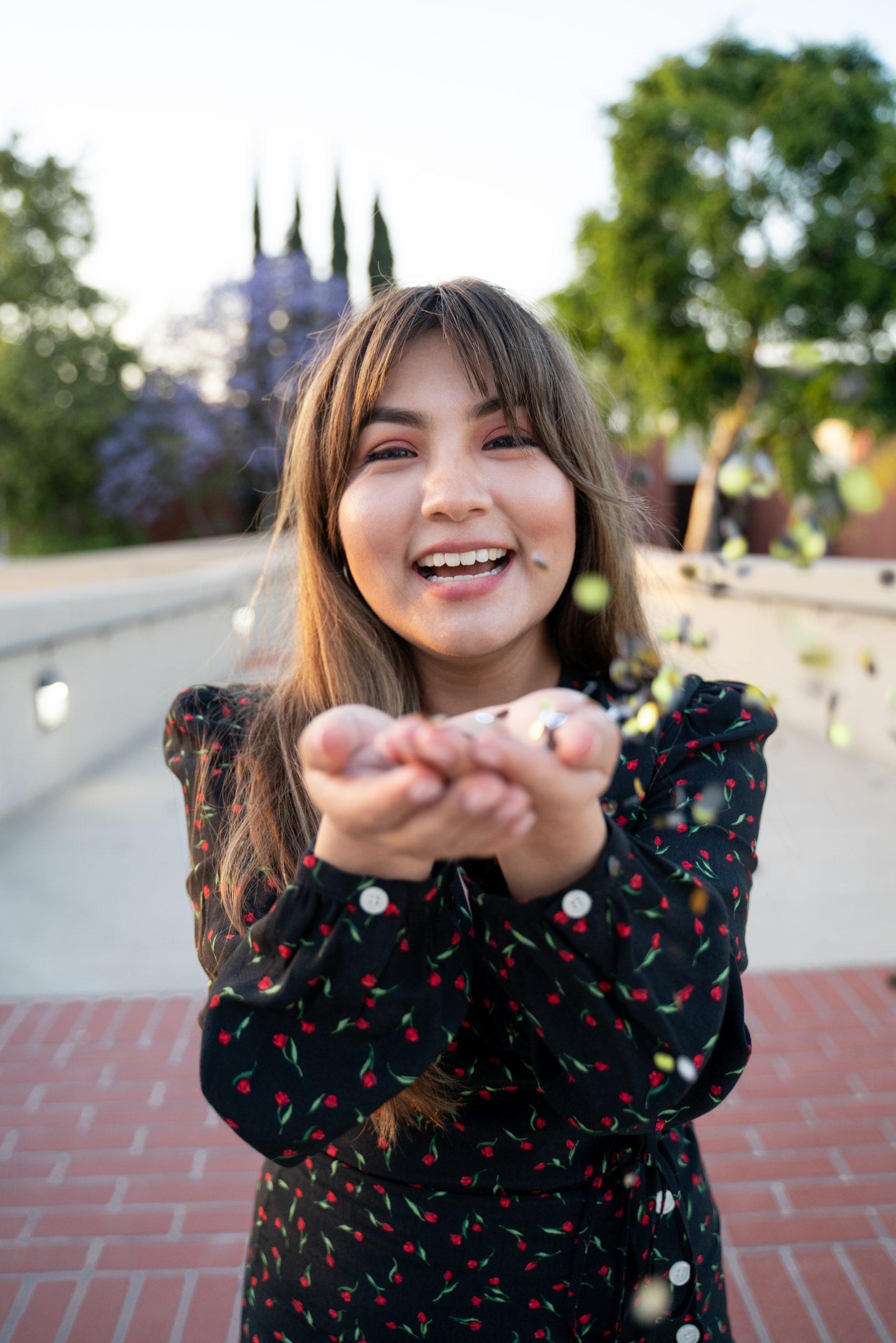 Graduation portrait with cap and gown in Irvine