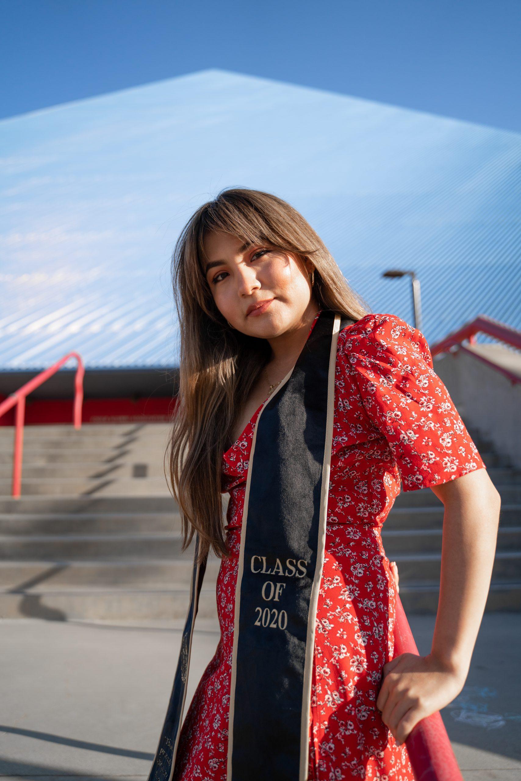 Graduate photographed outdoors