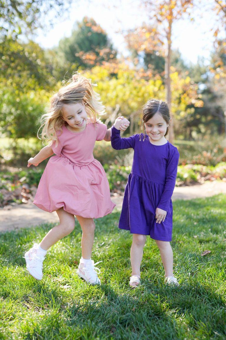 Children walking outdoors during an Orange County family session