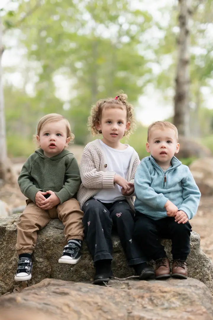 Children sitting on rocks at Jeffrey Open Space Trail in Irvine